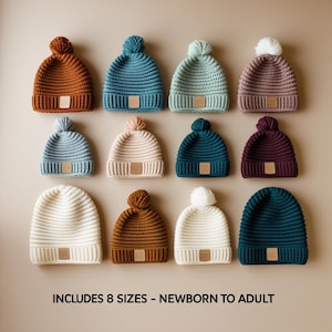 May include: A collection of ribbed knit beanies in various colors, including brown, blue, green, and pink, each with a matching pom-pom and a small, rectangular label. The text at the bottom reads "INCLUDES 8 SIZES - NEWBORN TO ADULT."