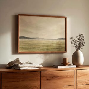 Gentle farmland landscape wall art featuring brushed texture and fading horizon line