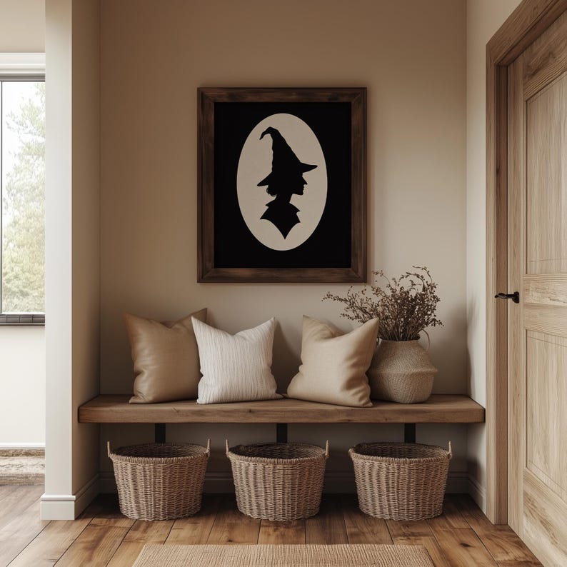 Tall pointed hat silhouette picture for entryway — cream and black Halloween wall art featuring dramatic profile design