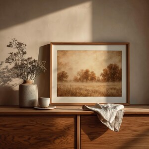 Soft cottage core poster featuring golden-hued trees and misty open countryside backdrop