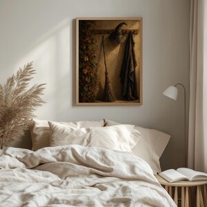 Dark romantic wall poster of pointed hat and mystical broom — ornate vintage composition
