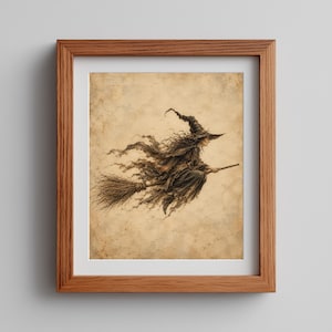 May include: A framed wall art print featuring a sepia-toned illustration of a figure in a pointed hat and tattered robes flying on a broomstick. The artwork is set against a textured, parchment-like background and enclosed in a wooden frame.