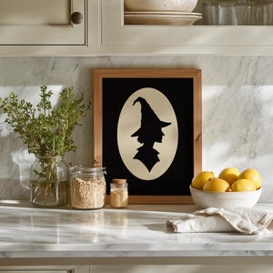 Spooky season wall décor featuring witch portrait — flat black silhouette cameo artwork for autumn home styling