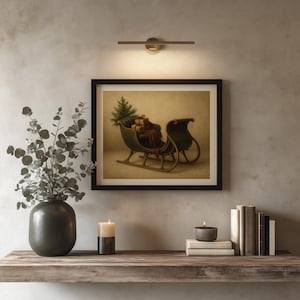 Nostalgic winter holiday picture printable art with sleigh, presents, and evergreen for farmhouse aesthetic spaces