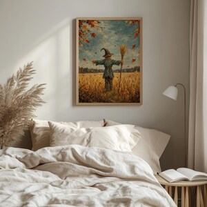 Vintage farm scarecrow wall poster for bedroom — textured artwork with distant trees, swirling leaves, and cozy harvest vibes