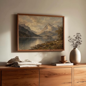 Dramatic peak landscape wall art with golden atmospheric light — vintage nature print for entryway