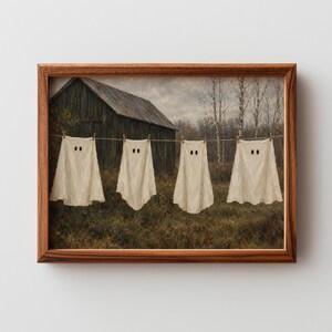 Ghostly laundry drying diorama picture for living space — charming vintage spooky countryside artwork with textured painting finish