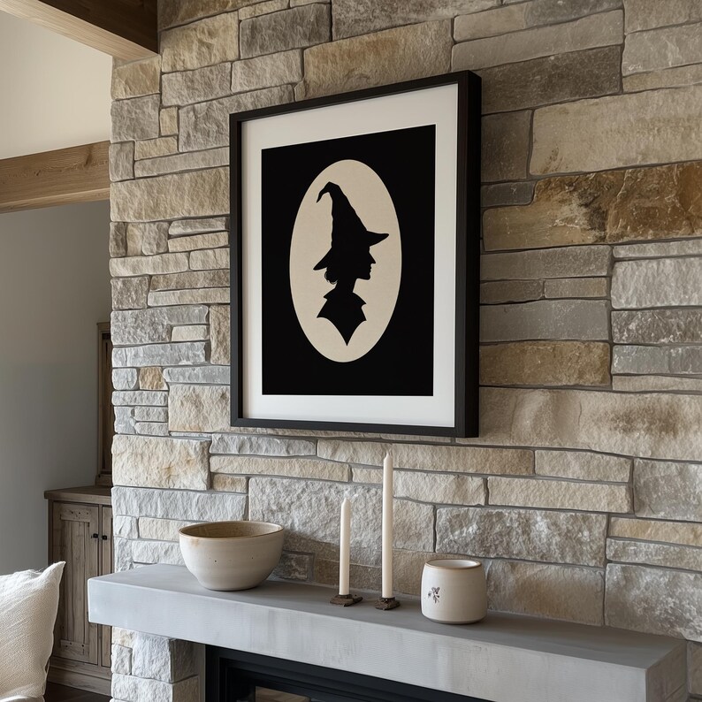 Magic practitioner silhouette wall art for kitchen — cream-backed black portrait cameo with timeless October vibes