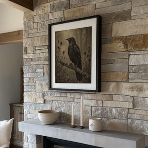 Dark academia raven wall poster for gothic room — muted tones with overgrown thistle stems and soft shadowy focus