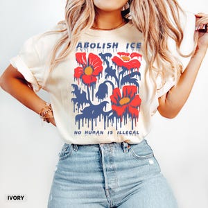 Comfort Colors® Floral Abolish ICE Human is Illegal Shirt, Anti-Trump Activist Tee, Political Resistance Shirt, No Human is Illegal Tee