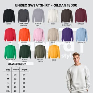Puede incluir: Exhibici&oacute;n de sudaderas unisex Gildan 18000 en varios colores, como gris, blanco y dorado. La imagen tambi&eacute;n muestra una tabla de tallas con medidas en cent&iacute;metros para ancho y largo.