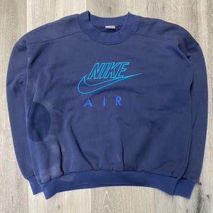 light blue vintage nike logo embroidered crewneck