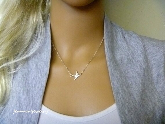 Silver bird necklace discount