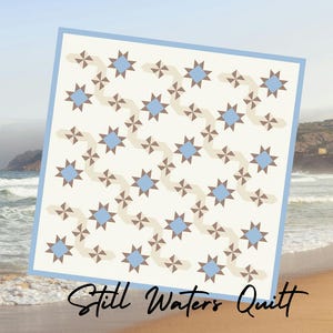 May include: A quilt with a repeating pattern of blue stars and brown cross-like shapes on an off-white background. The quilt is framed by a light blue border. The words "Still Waters Quilt" are written in cursive at the bottom.