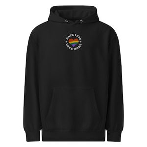 Love More Hate Less Pride Hoodie – LGBTQ+ Rainbow Hoodie – Inclusive Pride Month Sweatshirt Equality Gift for Ally Love Wins Unisex Hoodie