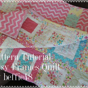 May include: A quilt pattern tutorial for an easy frames quilt, featuring a pink and white chevron fabric, and a white background with colourful floral and geometric patterns. The text "Pattern Tutorial Easy Frames Quilt by beffie48" is visible in the image.