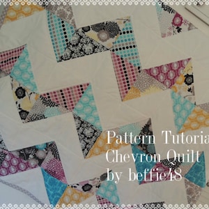 May include: Chevron quilt with a white background and a zigzag pattern. The quilt features colorful triangles with floral, polka dot, and geometric designs in shades of blue, pink, yellow, and black. The text "Pattern Tutorial Chevron Quilt by beffie48" is visible.
