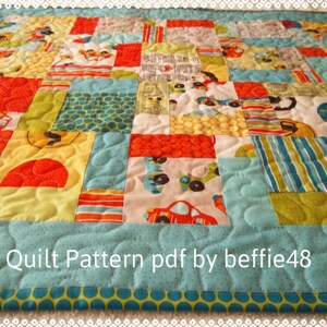 May include: A colorful patchwork quilt with a blue, green, yellow, red, and white color scheme. The quilt is made of various fabrics with different patterns, including stripes, polka dots, and geometric shapes. The quilt is quilted with a wavy pattern. The text "Quilt Pattern pdf by beffie48" is visible in the bottom right corner of the image.