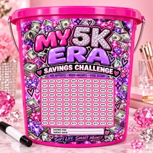 May include: A bright pink plastic bucket featuring a savings challenge label with the text MY 5K ERA SAVINGS CHALLENGE. The design includes graphics of US dollar bills, sparkling diamonds, and purple hearts, with a grid of circles labeled $25, $50, and $75.