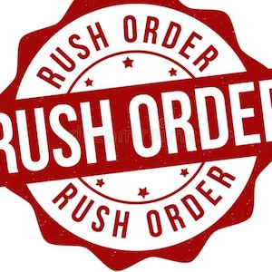 May include: A red and white circular stamp with the words "RUSH ORDER" in bold, capital letters. The text is arranged in a circular pattern, with the words repeated. The stamp has a distressed, textured appearance.