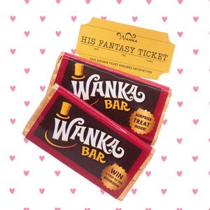 May include: Two rectangular chocolate bars with red and black wrappers labelled Wanka Bar, featuring a gold top hat icon. A gold ticket labelled His Fantasy Ticket with the text This Golden Ticket Ensures Satisfaction is positioned above the bars.