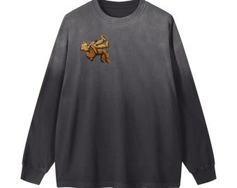 May include: A long-sleeved, dark gray shirt with a faded effect. The shirt features a small graphic of two teddy bears embracing on the upper left chest. The sleeves are long and the neckline is crew-cut.