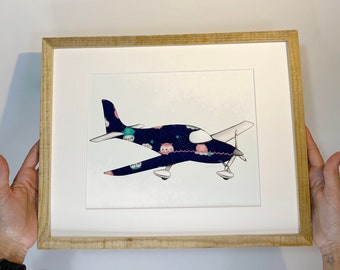 Make your own keepsake with outgrown baby clothes or sentimental clothing items, and hang it up! - The airplane.