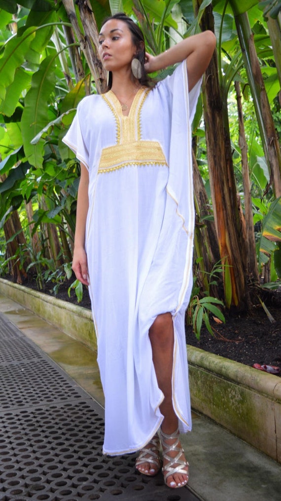 white and gold beach cover up