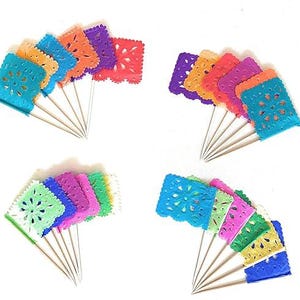 May include: A set of 20 colorful paper flags with intricate designs, perfect for adding a festive touch to any party or celebration. The flags are attached to wooden skewers and come in a variety of colors, including red, orange, yellow, green, blue, and purple.
