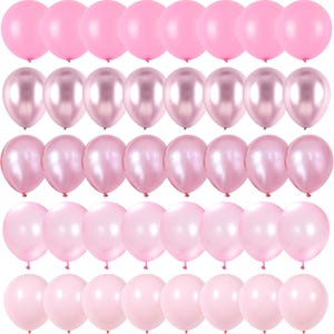 Puede incluir: Filas de globos rosas en varios tonos, desde rosa claro hasta rosa metálico. Los globos están dispuestos en un patrón de cuadrícula, creando una imagen festiva y decorativa.