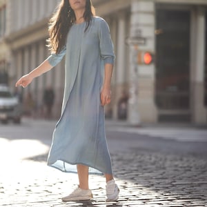 TENCEL pleat dress by profile-nyc featuring a flowing silhouette and elegant pleats, perfect for stylish occasions.