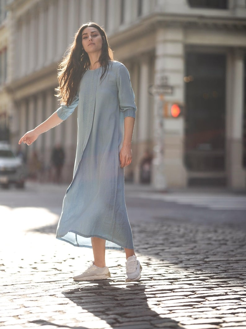 TENCEL pleat dress by profile-nyc featuring a flowing silhouette and elegant pleats, perfect for stylish occasions.