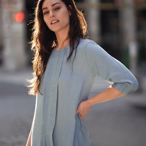 TENCEL pleat dress by profile-nyc featuring a flowing design and elegant pleats, perfect for stylish everyday wear.