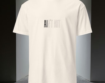 May include: A white t-shirt with the text "AIN'T ART" printed in black on the front.