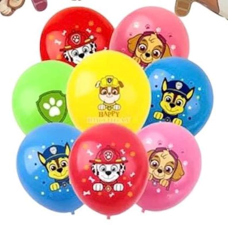 May include: A collection of colorful balloons featuring cartoon dog characters. The balloons are in various colors, including red, pink, blue, yellow, and green. Each balloon has a different character design, with the text "HAPPY" on one.