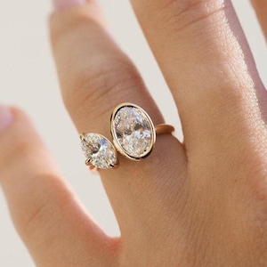 Oval Cut Colorless Moissanite Engagement Ring, Two Stone Oval Wedding Ring, Bezel Set Toi Et Moi Ring, 14K Solid Yellow Gold Oval Cut Ring