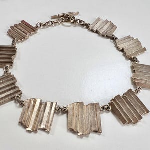 Vintage French designer brand BICHE de BERE  modern Geometric silver charm necklace  1990s Brutalist jewelry limited edition