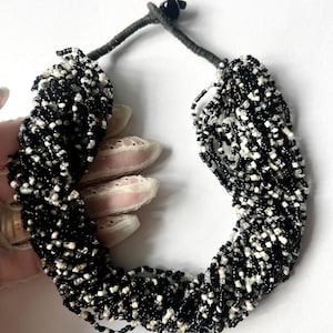 Vintage handmade multistrand black and white glass seed beads necklace with button clasp
