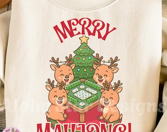 May include: Cream-colored sweatshirt with a festive design. The graphic features four reindeer playing mahjong around a table, a Christmas tree, and the words "MERRY MAHONG!" in red.