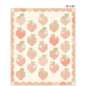 May include: A quilt pattern featuring a design of pink strawberries with green leaves and white flowers on a white background. The pattern is called "Sweet Strawberry" and is part of the "Dainty Meadow Fabric Collection". The pattern is 78 inches by 93 inches.
