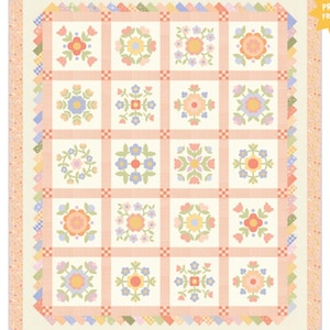 May include: A floral quilt featuring sixteen square blocks, each with a different flower design in pastel colors. The quilt has a cream background with peach-colored borders and a scalloped edge.