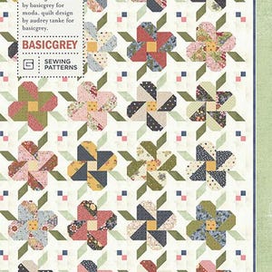 May include: A quilt pattern titled "Posey Pop" by Basicgrey. The design features repeating floral patterns in various colors, including pink, blue, green, and yellow, set against a white background. The pattern includes the text "PAT089" and "Sewing Patterns".
