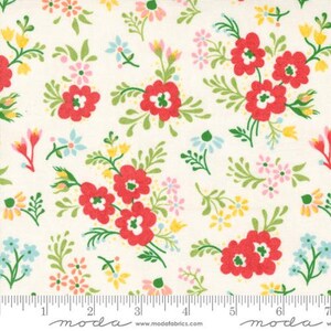 May include: White fabric with a small-scale floral print. The flowers are red, pink, yellow, and blue. The background is white.