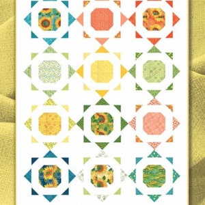 May include: A quilt pattern called "Simple Solstice" by Robin Pickens Quilt Patterns. The pattern is a layer cake friendly design with a repeating geometric pattern of squares and triangles. The squares are filled with various floral and geometric prints in shades of yellow, green, blue, orange, and pink.