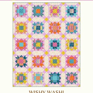 May include: A colorful quilt pattern with a repeating starburst design in shades of blue, pink, orange, and yellow. The quilt is labeled "WISHY WASHI" and is available in runner, baby, and throw sizes. The Copper Kettle Quilt Company logo is at the top.