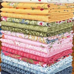 May include: A tall stack of folded fabric in various colors and floral patterns. The fabrics include shades of yellow, pink, red, green, and blue. The fabrics appear to be cotton and are neatly stacked on top of each other.