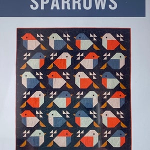 May include: A quilt pattern featuring a design of sparrows with a dark blue background, orange, white, and light blue accents. The pattern is titled "Sparrows" and is described as a traditionally pieced quilt pattern for the advanced beginner sewist and up.