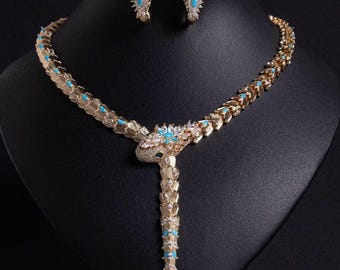 Serpenta by Aureme – Sculpted Gold Snake Necklace and Earrings Set
