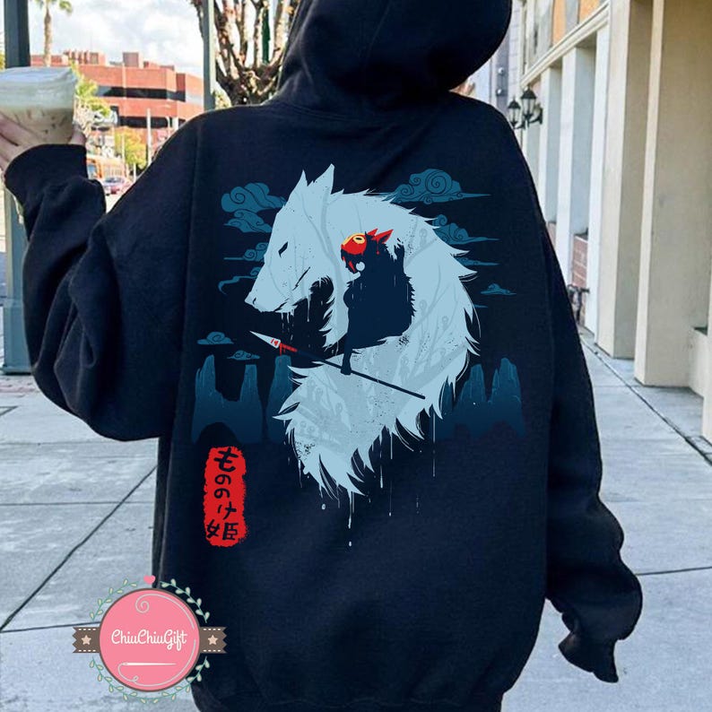 May include: Dark blue hoodie with a white wolf and a red figure design, set against a blue and black landscape. Japanese text is visible on the lower back. The hoodie has a drawstring hood.