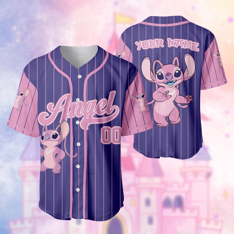 May include: A baseball jersey featuring a pink cartoon character and the word "Angel" in script. The jersey has a blue pinstripe design with pink accents on the sleeves and shoulders. The number "00" is displayed on the front.